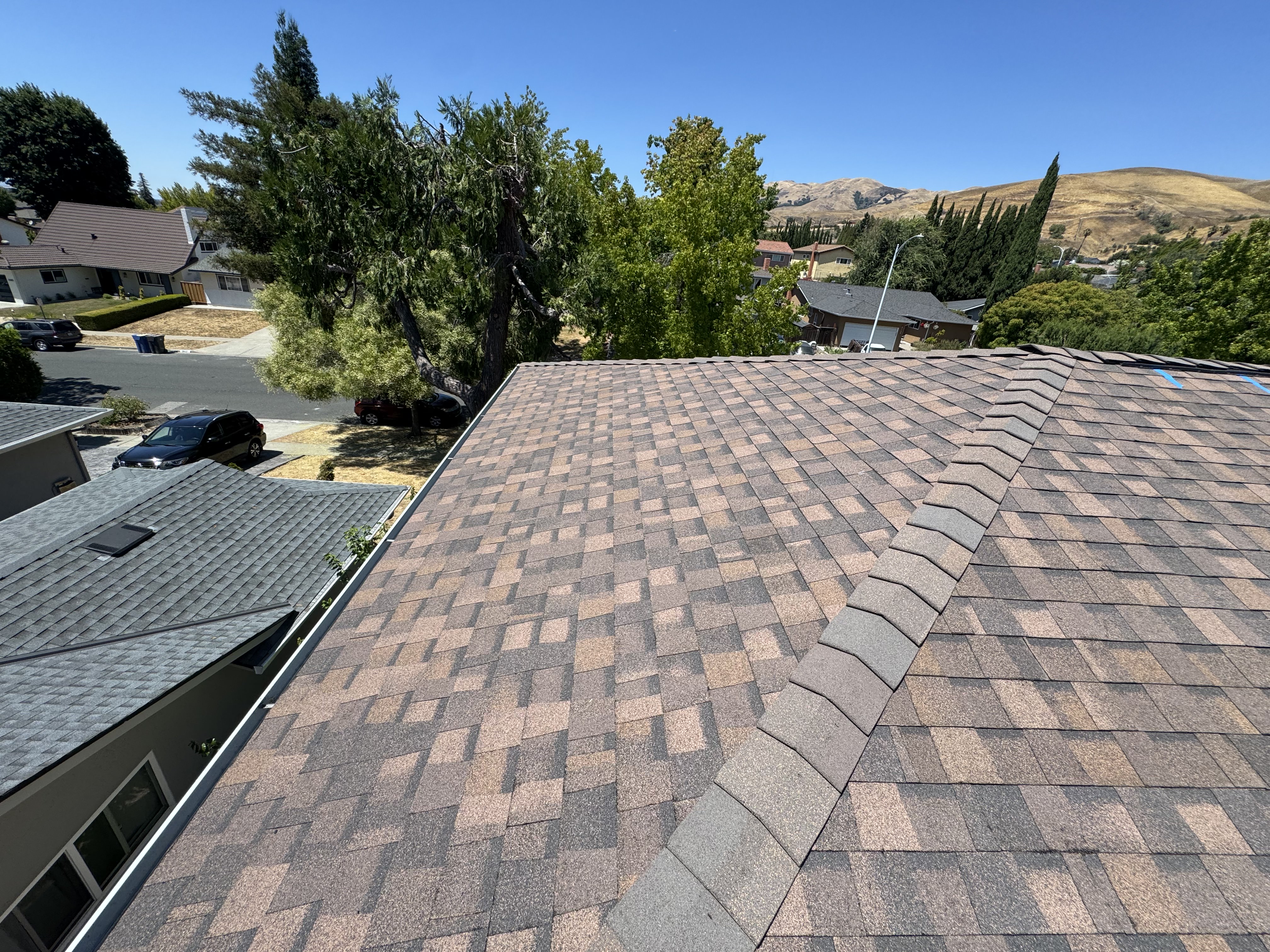 Panoramic view of newly installed shingle roof on a Milpitas, CA home in the Bay Area.